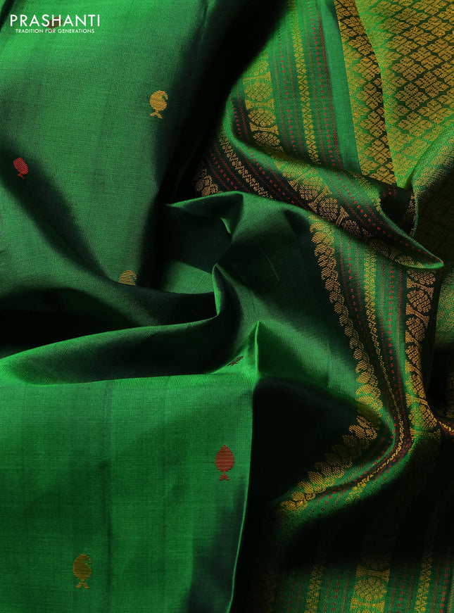 Pure soft silk saree green with allover thread woven buttas and rettapet thread woven border
