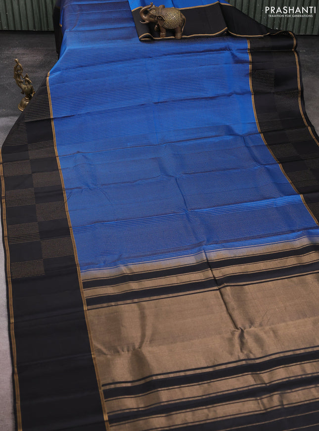Pure soft silk saree blue and black with allover zari stripes pattern and rettapet zari woven border