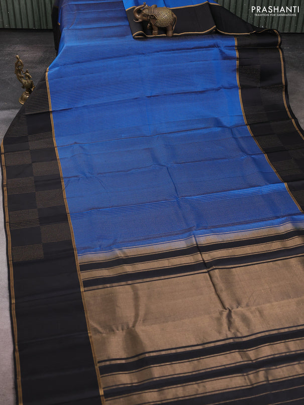 Pure soft silk saree blue and black with allover zari stripes pattern and rettapet zari woven border