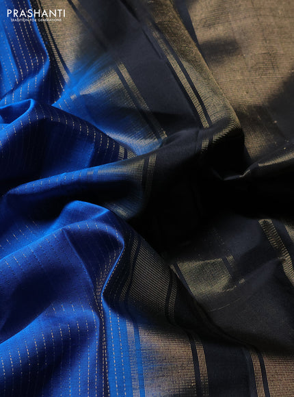 Pure soft silk saree blue and black with allover zari stripes pattern and rettapet zari woven border