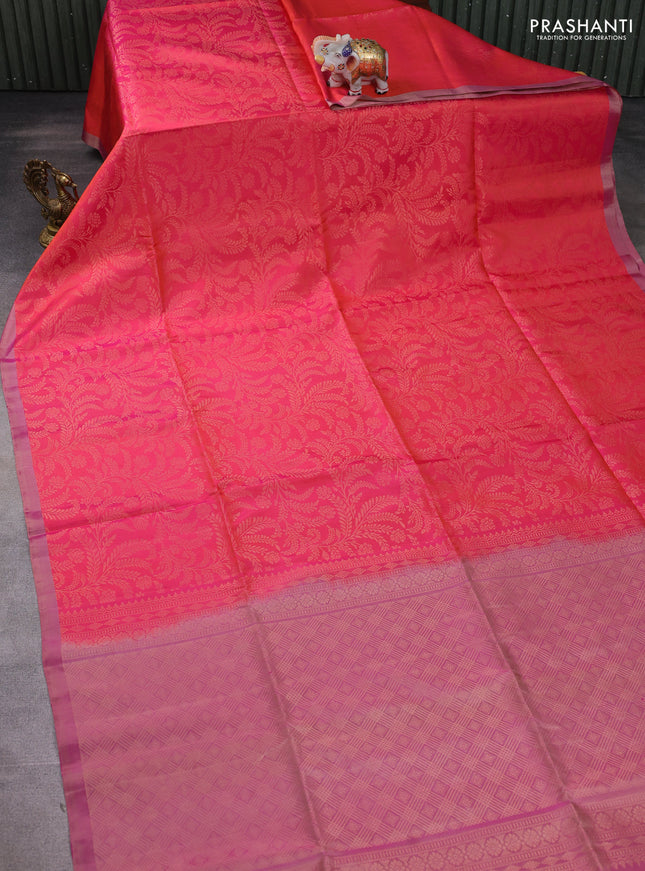 Pure soft silk saree peach shade and purple with allover zari brocade weaves and piping border