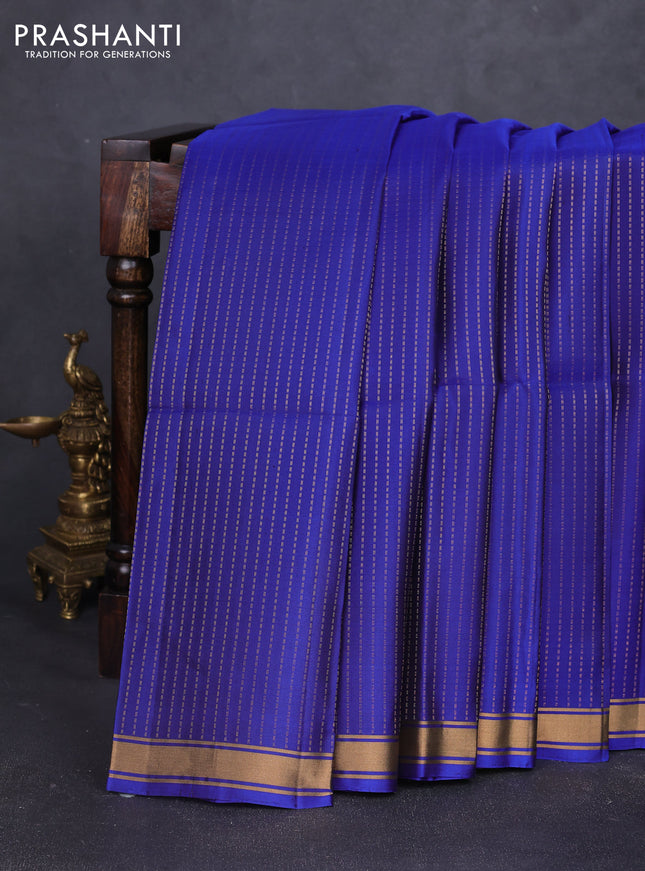 Pure soft silk saree blue and light green with allover zari weaves and zari woven border