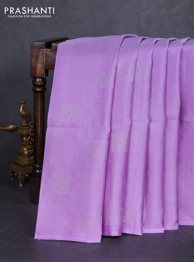 Pure soft silk saree lavender and teal blue with allover silver zari woven brocade weaves in borderless style