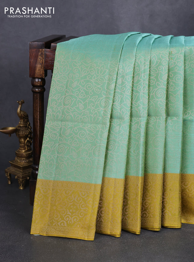 Pure soft silk saree pastel green and mustard green with allover zari brocade weaves and zari woven border
