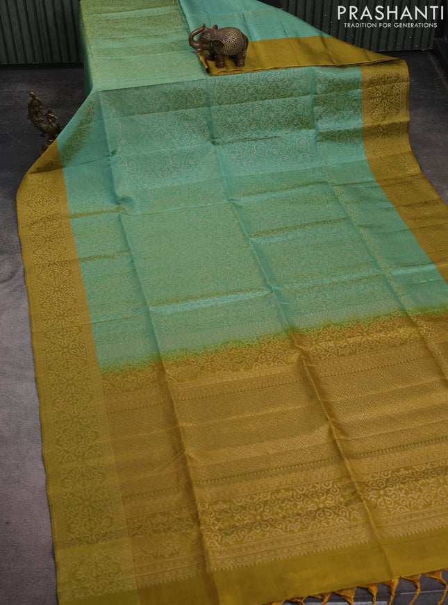 Pure soft silk saree pastel green and mustard green with allover zari brocade weaves and zari woven border