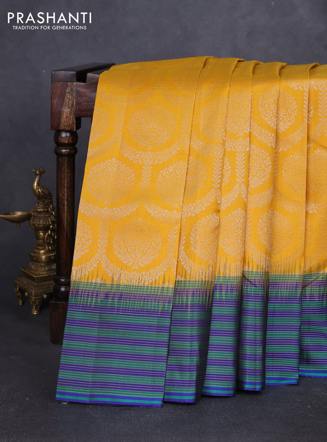 Pure soft silk saree yellow and blue with allover zari brocade weaves and zari woven border