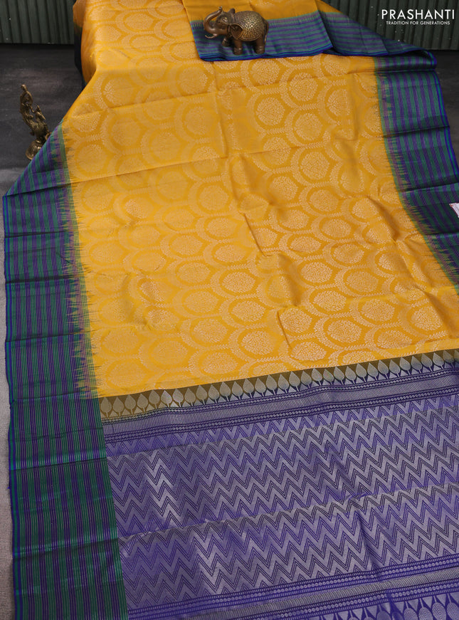 Pure soft silk saree yellow and blue with allover zari brocade weaves and zari woven border