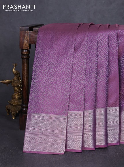 Pure soft silk saree purple with allover zari brocade weaves and zari woven border