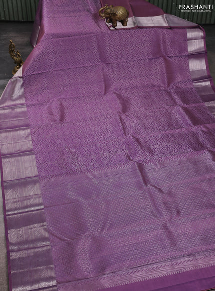 Pure soft silk saree purple with allover zari brocade weaves and zari woven border