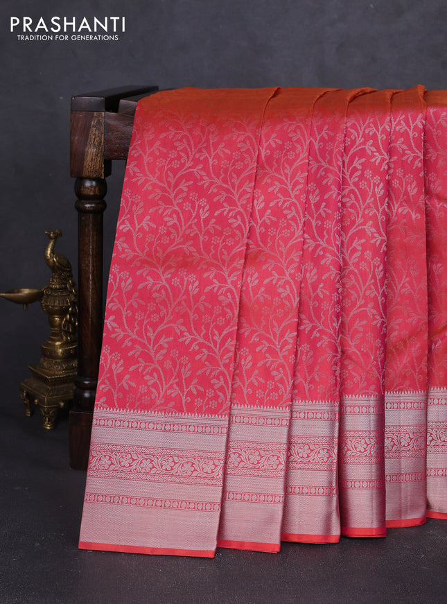Pure soft silk saree dual shade of pinkish orange with allover zari brocade weaves and zari woven border