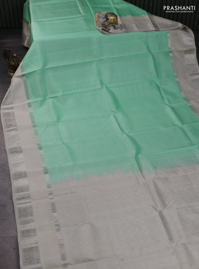 Pure soft silk saree teal green and beige with allover thread checked pattern and rettapet zari woven border