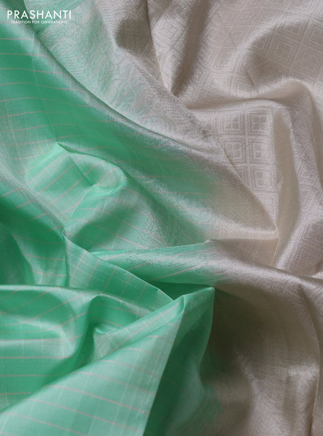 Pure soft silk saree teal green and beige with allover thread checked pattern and rettapet zari woven border
