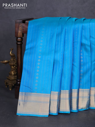 Pure soft silk saree teal blue with allover zari weaves & buttas and zari woven border