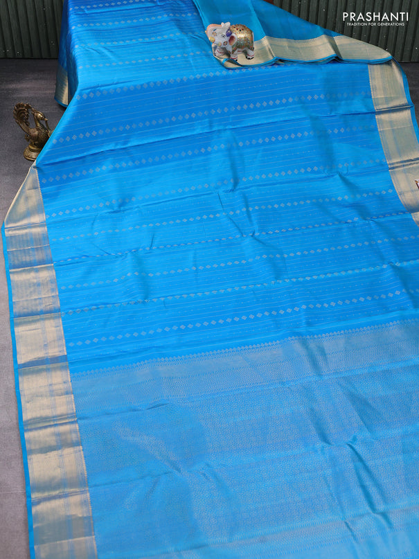 Pure soft silk saree teal blue with allover zari weaves & buttas and zari woven border