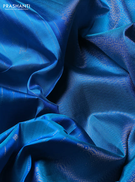 Pure soft silk saree teal blue with allover zari weaves & buttas and zari woven border