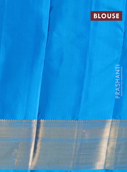 Pure soft silk saree teal blue with allover zari weaves & buttas and zari woven border