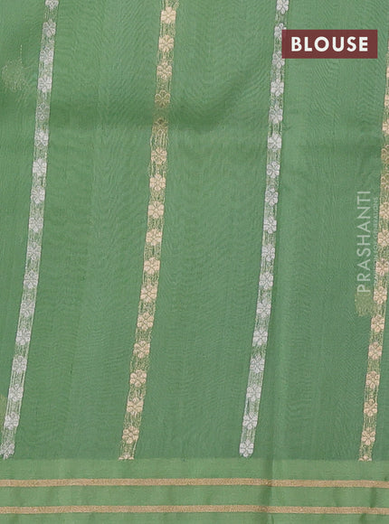 Banarasi organza silk saree green shade with allover silver & gold zari weaves and zari woven border