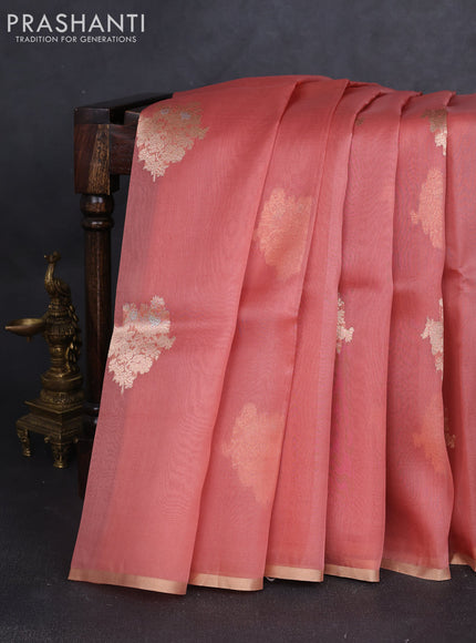 Banarasi organza silk saree peach shade with zari woven buttas and zari woven border