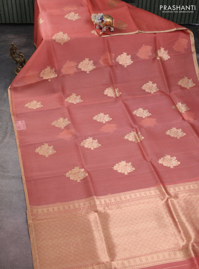 Banarasi organza silk saree peach shade with zari woven buttas and zari woven border