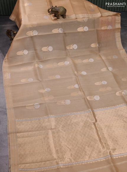 Banarasi organza silk saree sandal with floral zari woven buttas and zari woven border