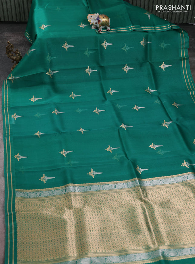 Banarasi organza silk saree green shade with zari woven buttas and zari woven border