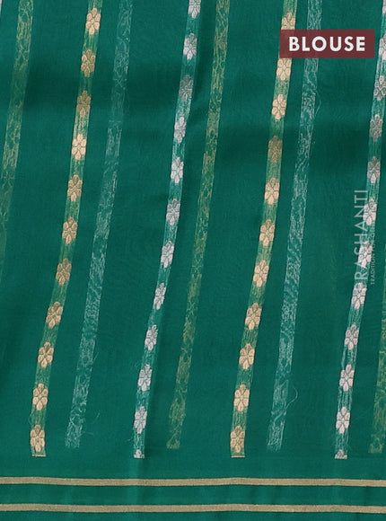 Banarasi organza silk saree green shade with zari woven buttas and zari woven border