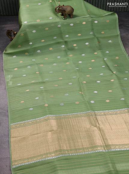 Banarasi organza silk saree pista green with allover zari weaves and piping border