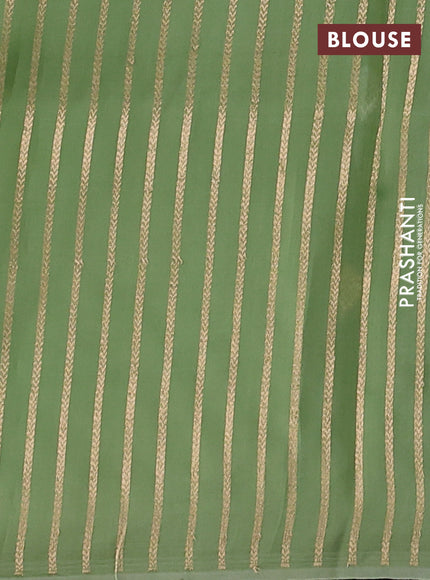 Banarasi organza silk saree pista green with allover zari weaves and piping border