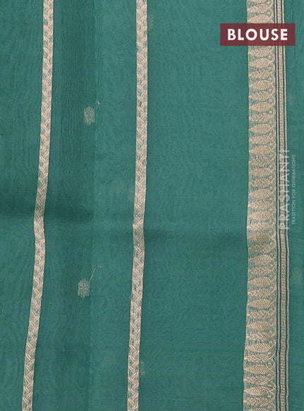 Banarasi organza silk saree pastel green with allover zari woven buttas and zari woven border