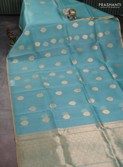 Banarasi organza silk saree teal blue with zari woven buttas and zari woven border