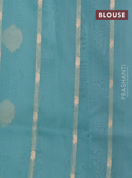 Banarasi organza silk saree teal blue with zari woven buttas and zari woven border
