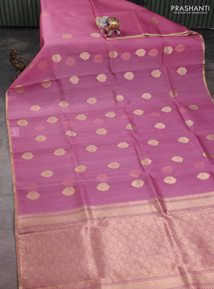 Banarasi organza silk saree peach pink with zari woven buttas and zari woven border