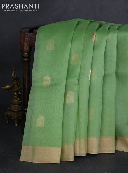 Banarasi organza silk saree light green with zari woven buttas and zari woven border