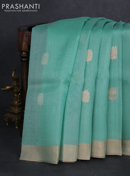 Banarasi organza silk saree teal green with prints & sequin embroidery work and zari woven border