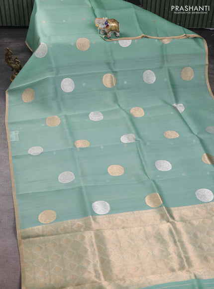 Banarasi organza silk saree pastel green with rudraksha silver & gold zari woven buttas and zari woven border