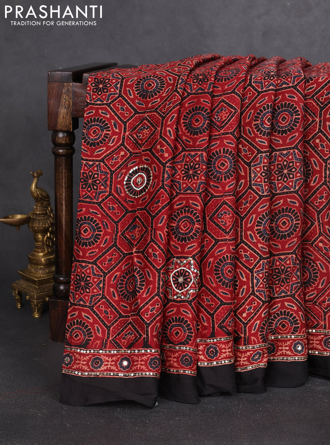 Modal silk saree maroon and black with allover ajrakh prints & mirror work and sequin embroidered work pallu