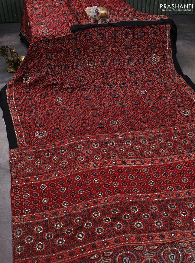 Modal silk saree maroon and black with allover ajrakh prints & mirror work and sequin embroidered work pallu