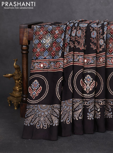 Modal silk saree black with allover ajrakh prints & sequin work and sequin embroidered work pallu