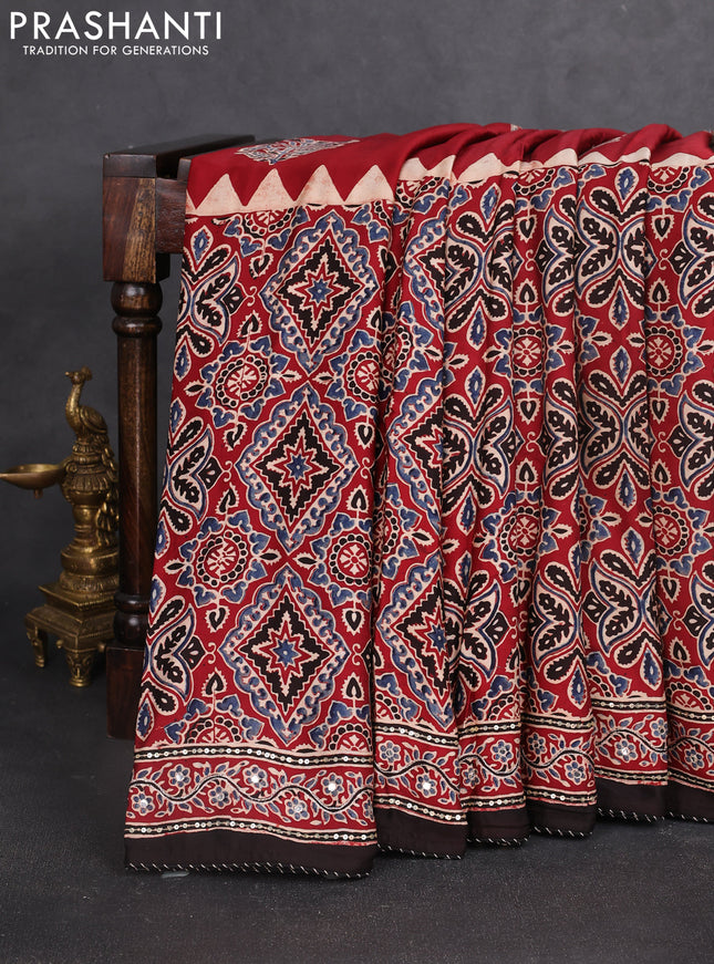 Modal silk saree maroon and coffee brown with allover ajrakh prints and sequin embroidered work pallu