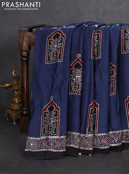 Modal silk saree blue and black with allover ajrakh prints and sequin embroidered work pallu