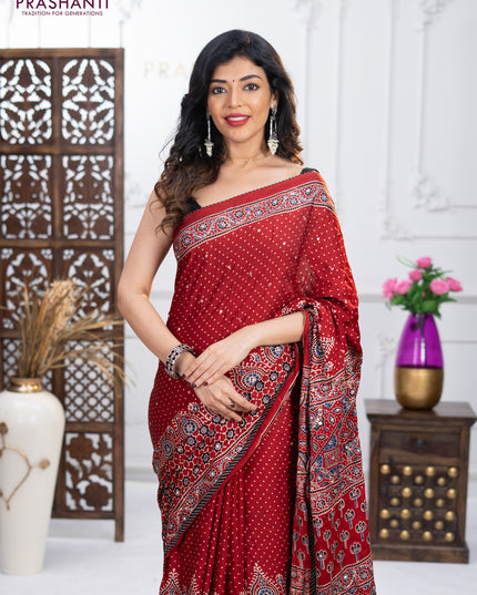 Modal silk saree maroon with ajrakh prints & mirror work and sequin embroidered work pallu