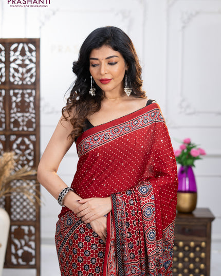 Modal silk saree maroon with ajrakh prints & mirror work and sequin embroidered work pallu