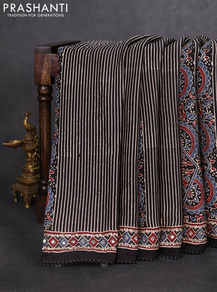 Modal silk saree beige and black with allover ajrakh prints and sequin embroidered work pallu