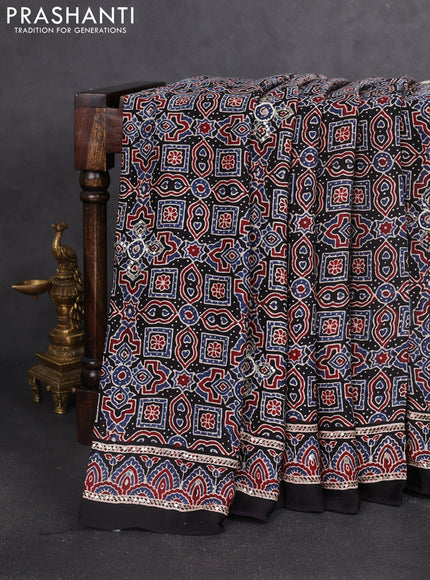Modal silk saree black with allover ajrakh prints & sequin work and sequin embroidered work pallu