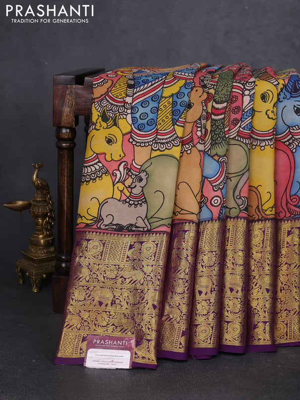 Pure kanchipuram silk saree peach shade and purple with allover penkalamkari prints and long rich annam zari woven border