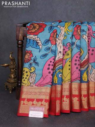 Pure kanchipuram silk saree blue and red with allover penkalamkari prints and rich peacock zari woven border