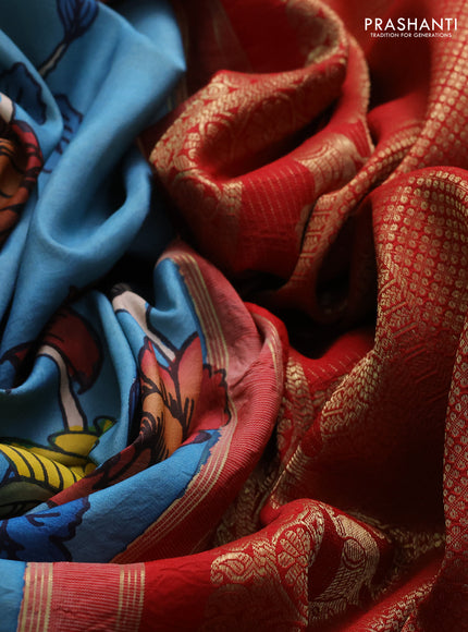 Pure kanchipuram silk saree blue and red with allover penkalamkari prints and rich peacock zari woven border