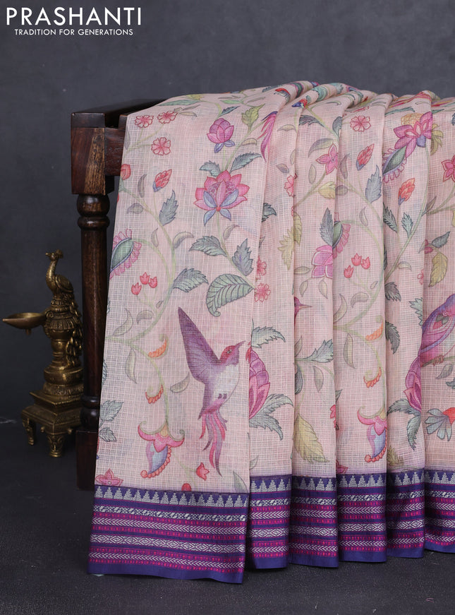 Kota silk cotton saree pastel peach and dark blue with allover digital prints and thread woven border