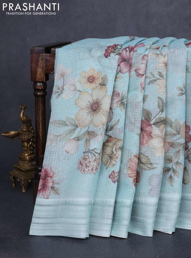 Kota silk cotton saree teal blue with allover floral digital prints and thread woven border