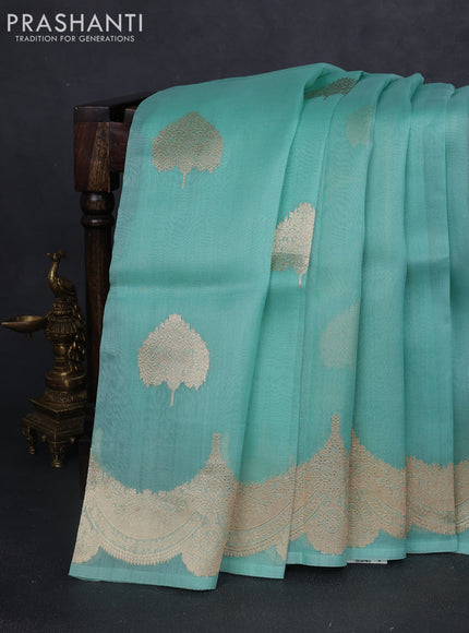 Banarasi organza silk saree teal blue with zari woven buttas and zari woven border